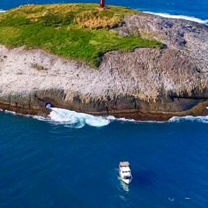 Mergulho de batismo nas aguas da Ilha Escalvada, em Guarapari, com a Atlantes